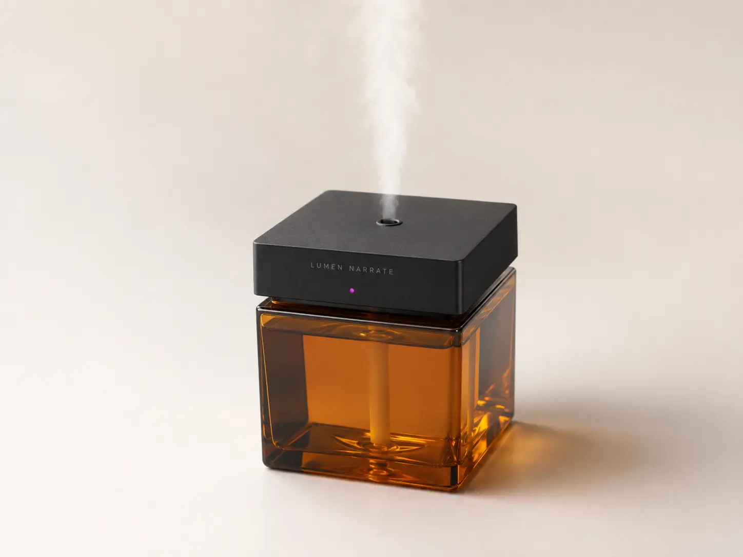 Lumen Narrate clap-controlled electronic fragrance sprayer with square amber reservoir