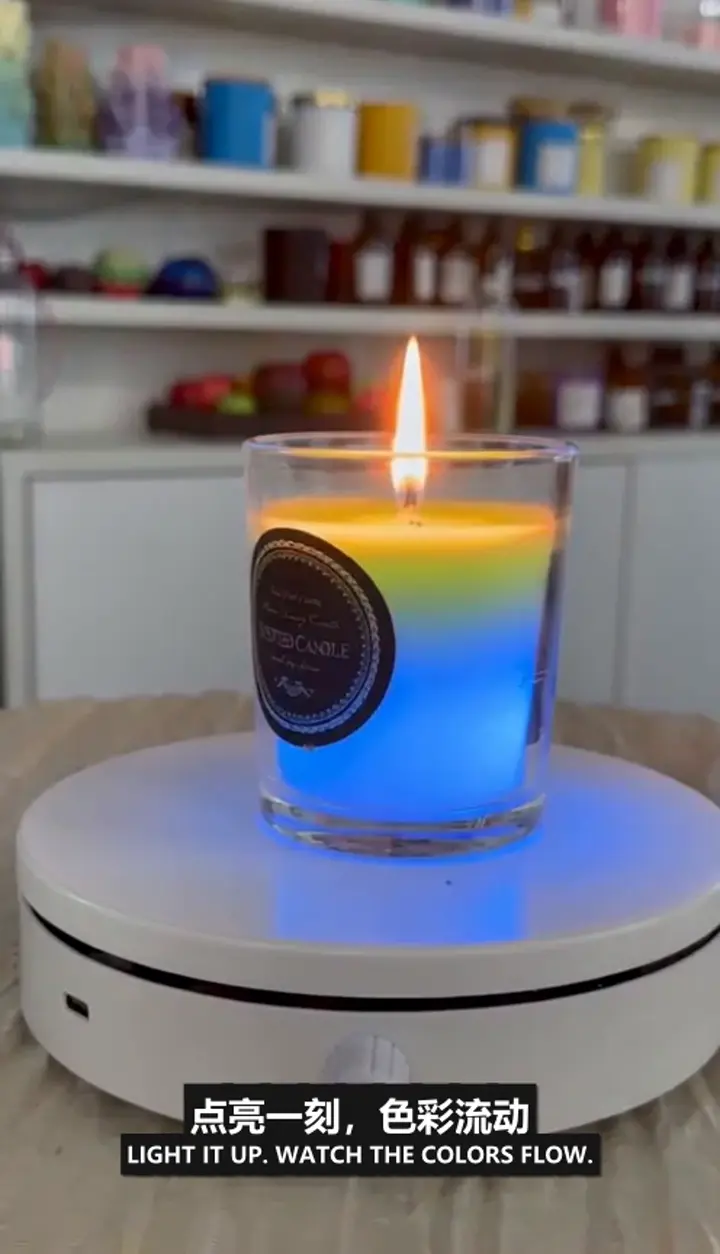145g color-glow scented candle lit with flowing blue and green color