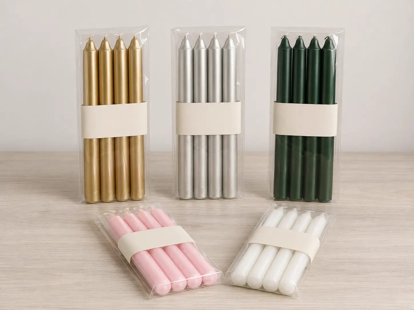 Four-piece taper candle packs shown as packaging references for carton and freight planning